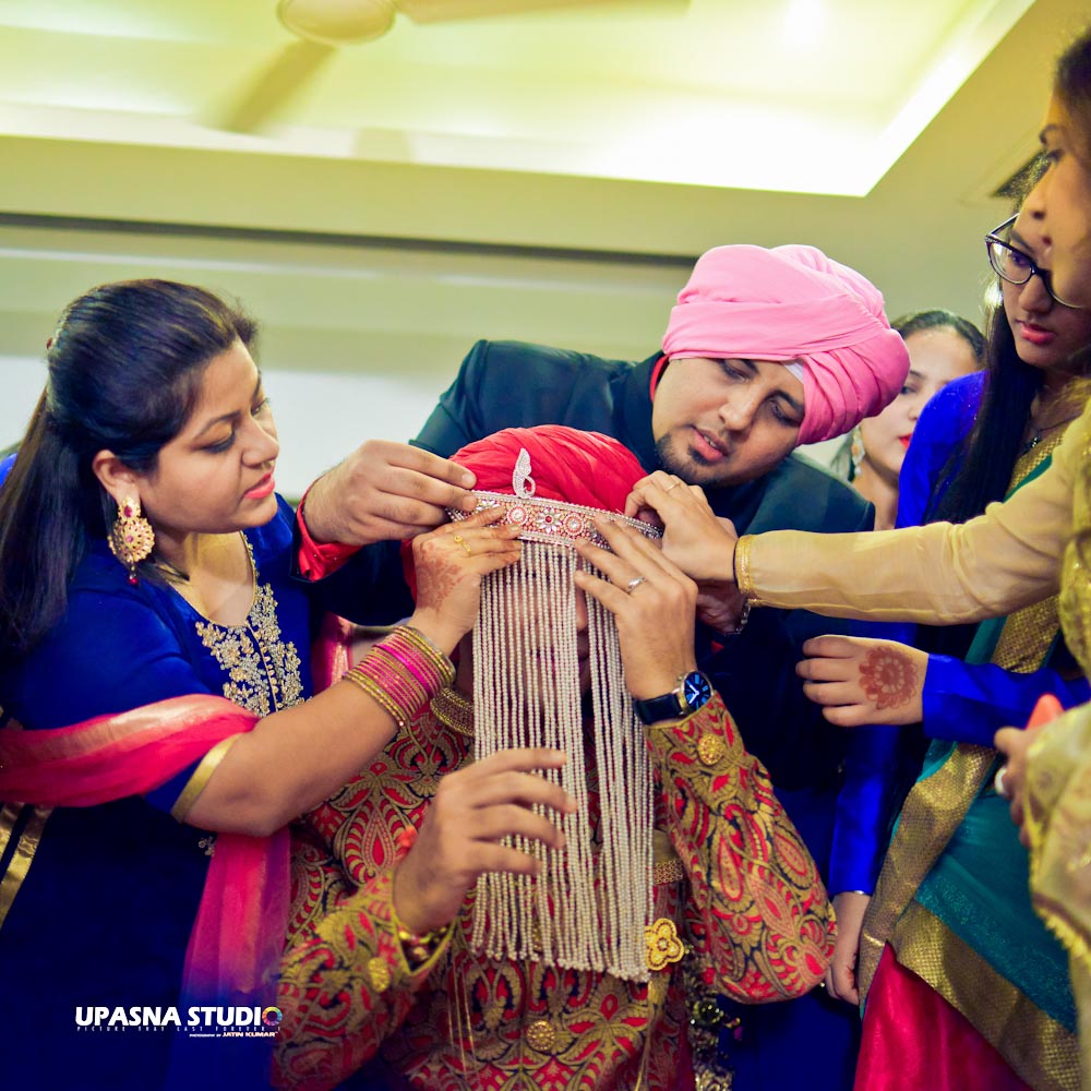 Indian groom sehrabandi ritual